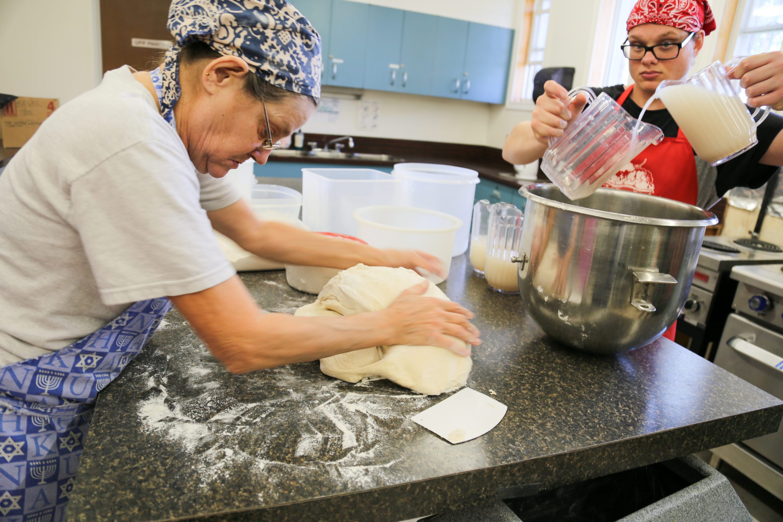 DSP supports person with baking dough.